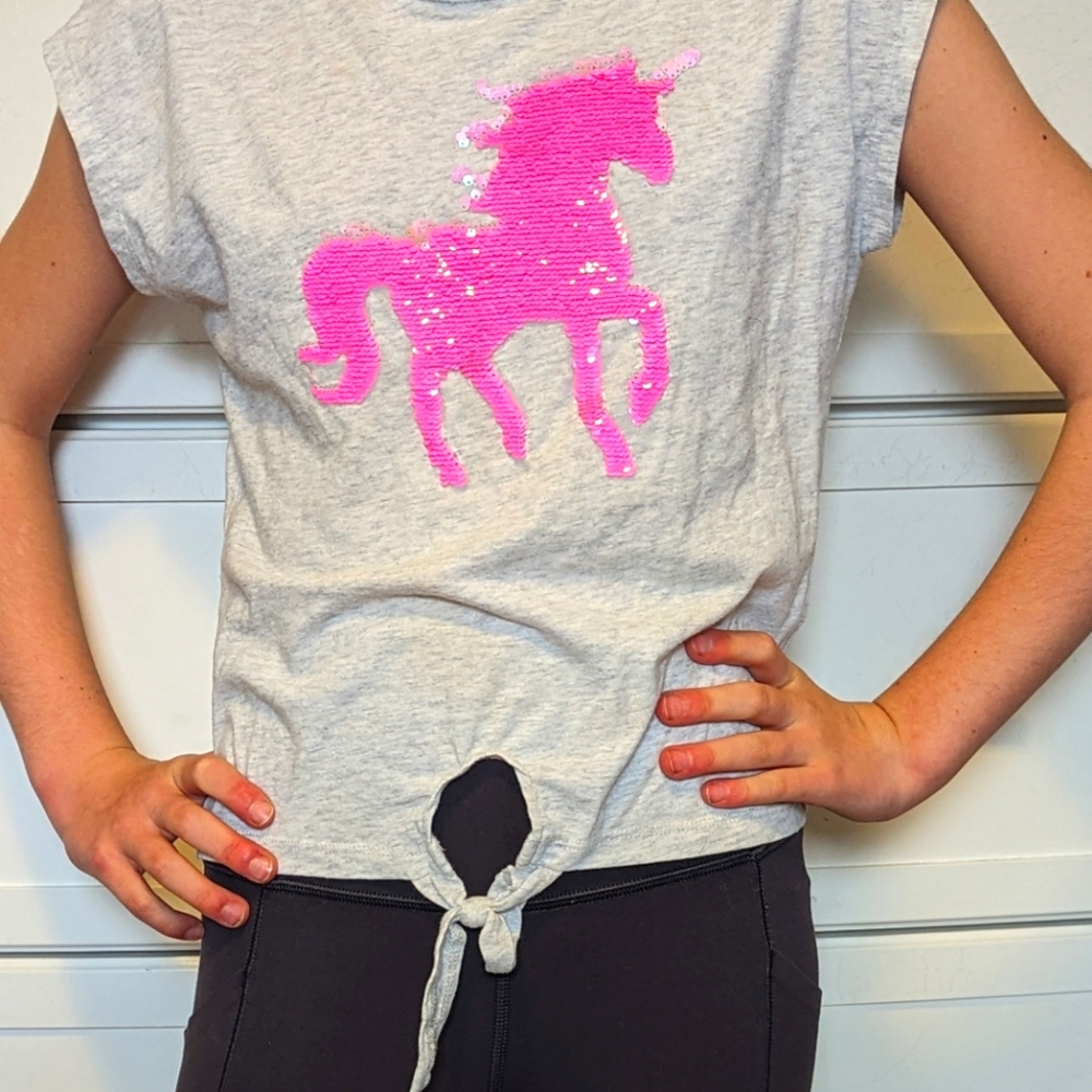 Grey T-shirt with pink sequin unicorn and cute cutout not in bottom front